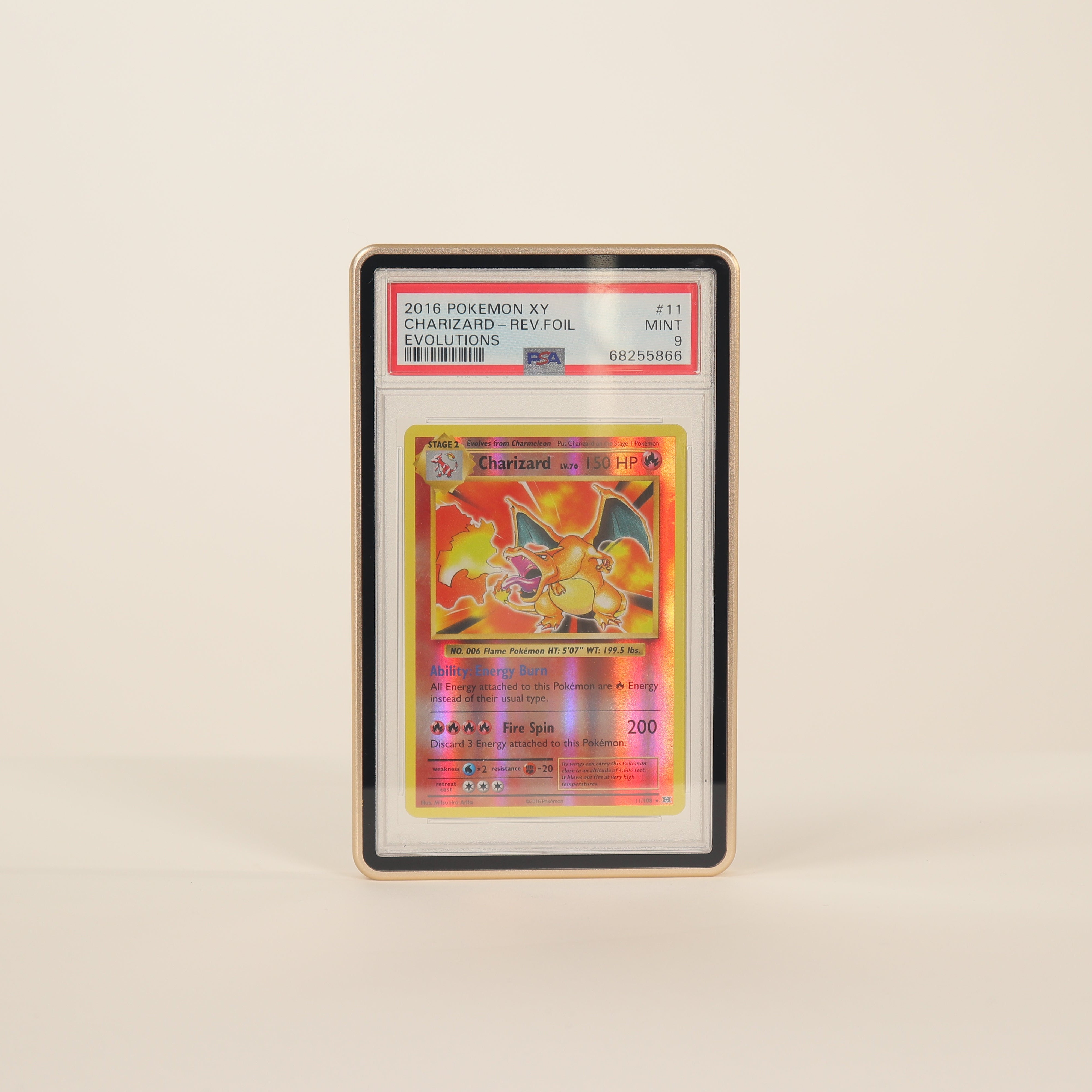 Trading card in a protective case on a beige background